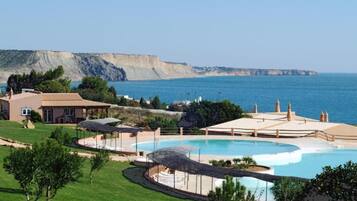 2 outdoor pools, open 10:00 AM to 9:00 PM, pool loungers