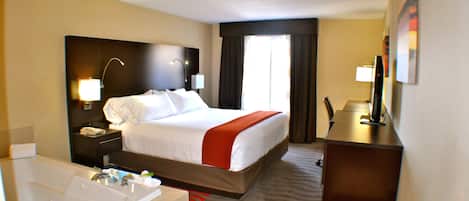 Chambre Standard, 1 trĂšs grand lit, baignoire Ă jets | Bureau, rideaux dâobscurcissement, fer et planche Ă repasser
