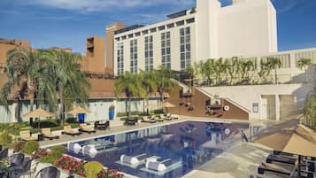 Outdoor pool, open 9:00 AM to 7:30 PM, pool umbrellas, pool loungers