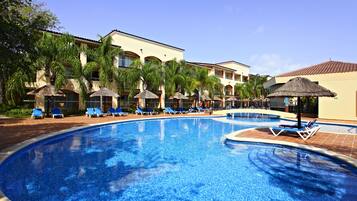 8 outdoor pools, pool umbrellas, sun loungers