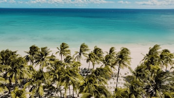 On the beach, white sand, beach massages, scuba diving