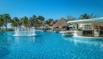 Outdoor pool, open 8 AM to 8 PM, pool umbrellas, sun loungers