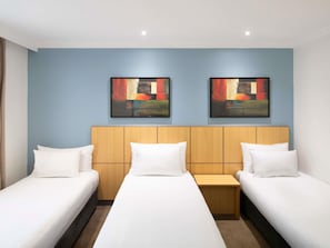 Standard Triple Room, 3 Single Beds | Premium bedding, in-room safe, desk, laptop workspace