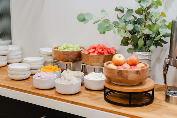 Daily buffet breakfast (AUD 27.5 per person)