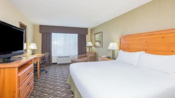 Desk, laptop workspace, blackout drapes, iron/ironing board