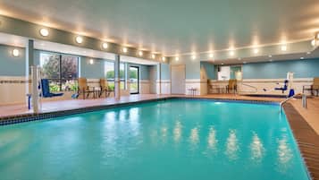 Indoor pool, open 6 AM to 10:00 PM, pool loungers