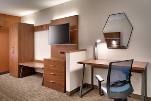 Desk, laptop workspace, blackout drapes, iron/ironing board