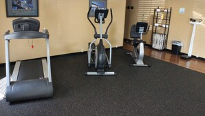 A fitness room with a treadmill, elliptical, and stationary bike. - Holiday Inn Express Hanover by IHG (Hanover)