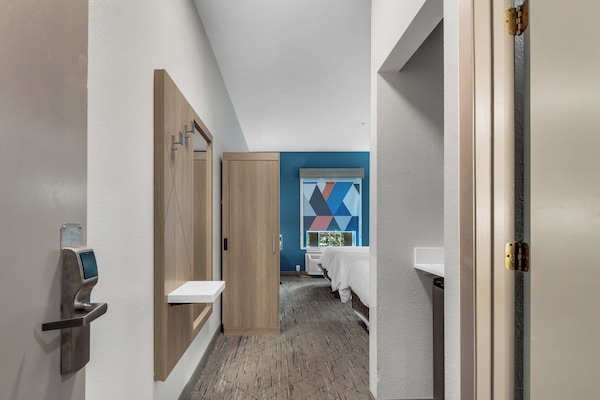 Standard Room, 2 Queen Beds | In-room safe, desk, blackout drapes, iron/ironing board