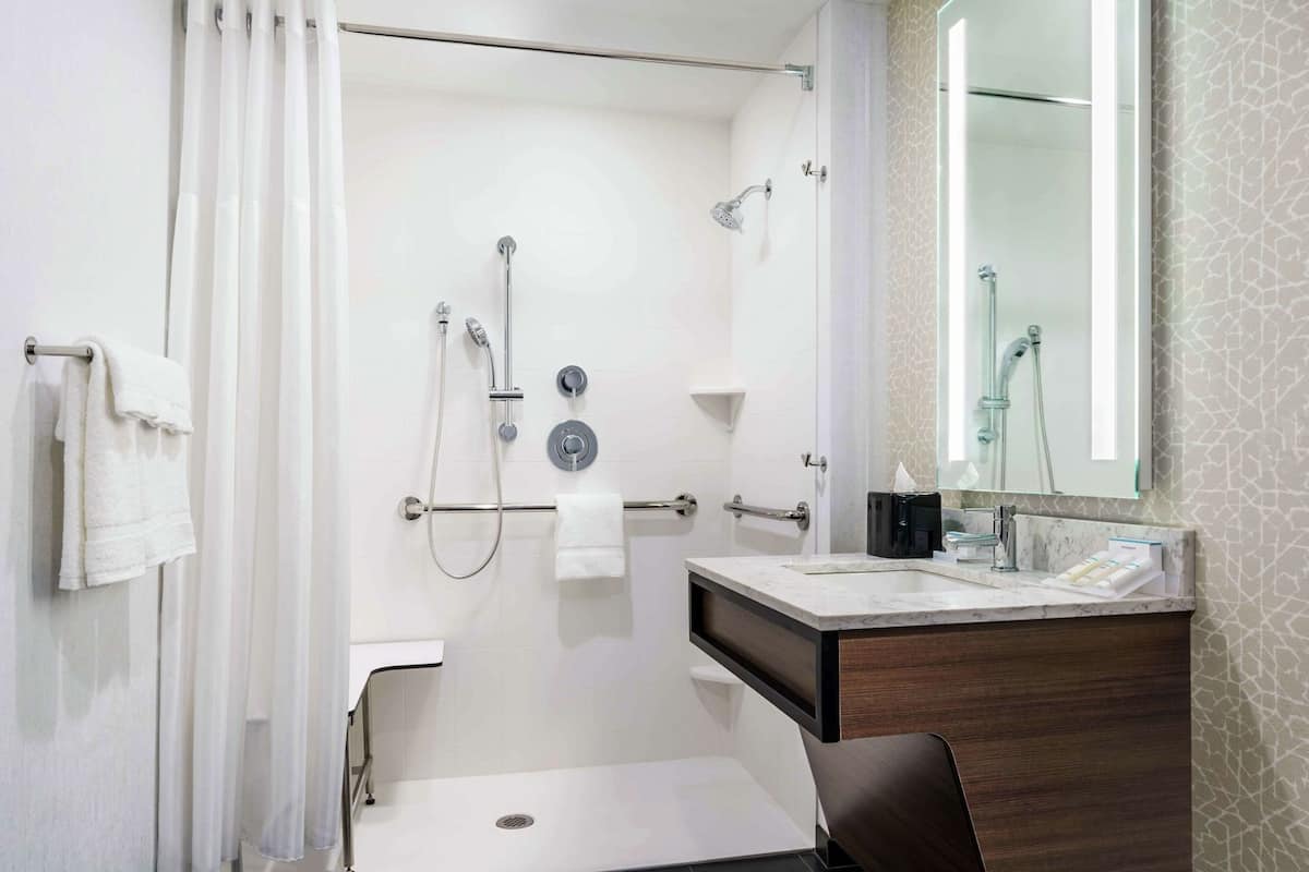 Bathroom | Designer toiletries, hair dryer, towels