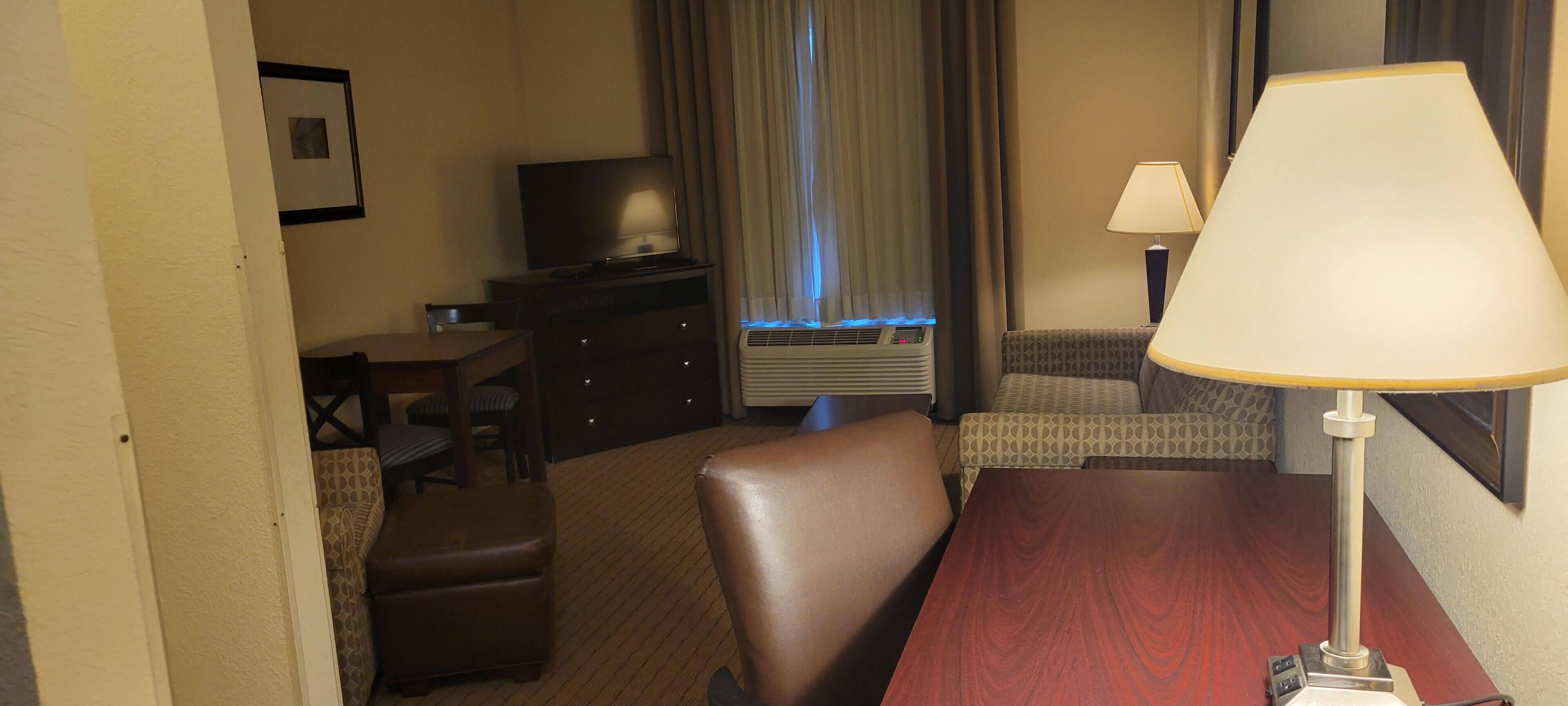 king two room suite | living area | flat-screen tv