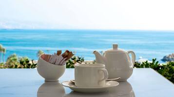 Daily buffet breakfast (USD 28 per person)