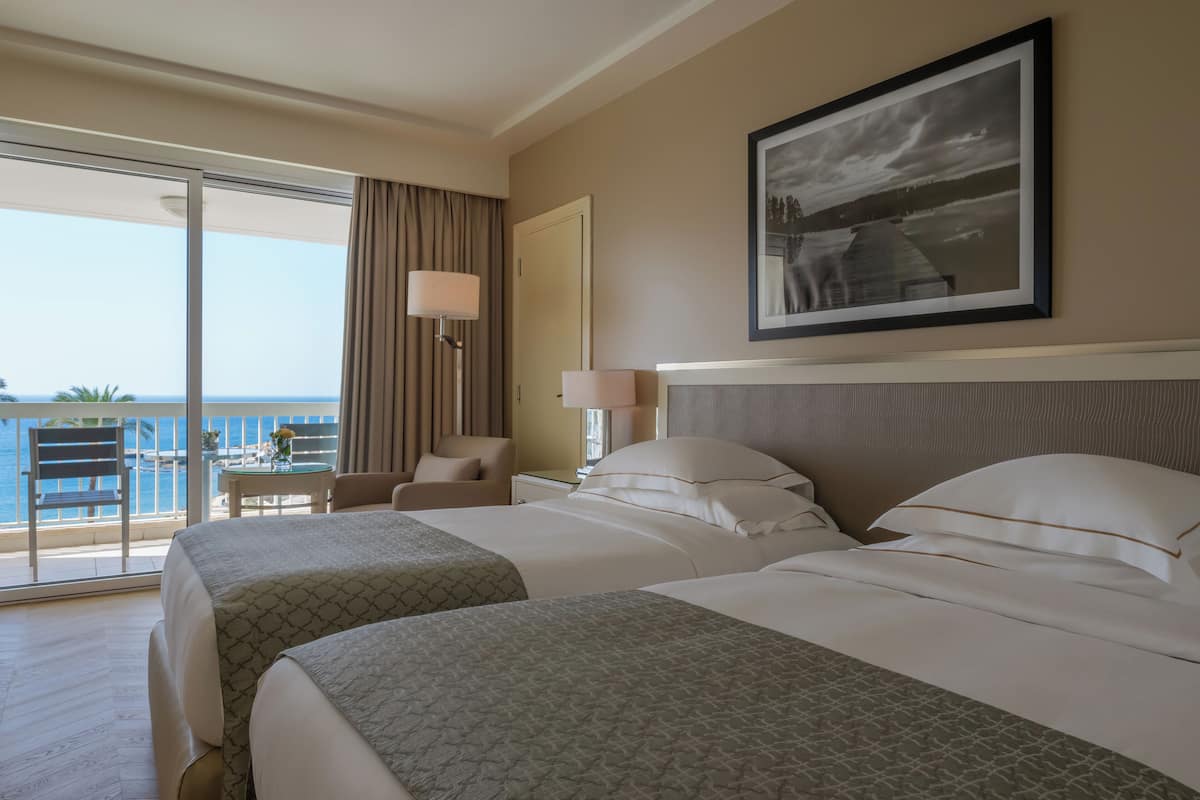 Deluxe Twin Room, 2 Twin Beds, Sea View | 1 bedroom, minibar, in-room safe, desk