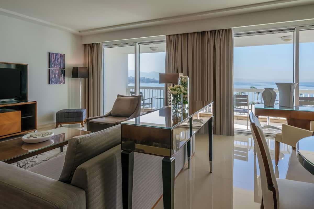 Suite, 1 King Bed, Sea View (Ambassador) | Living area | Flat-screen TV