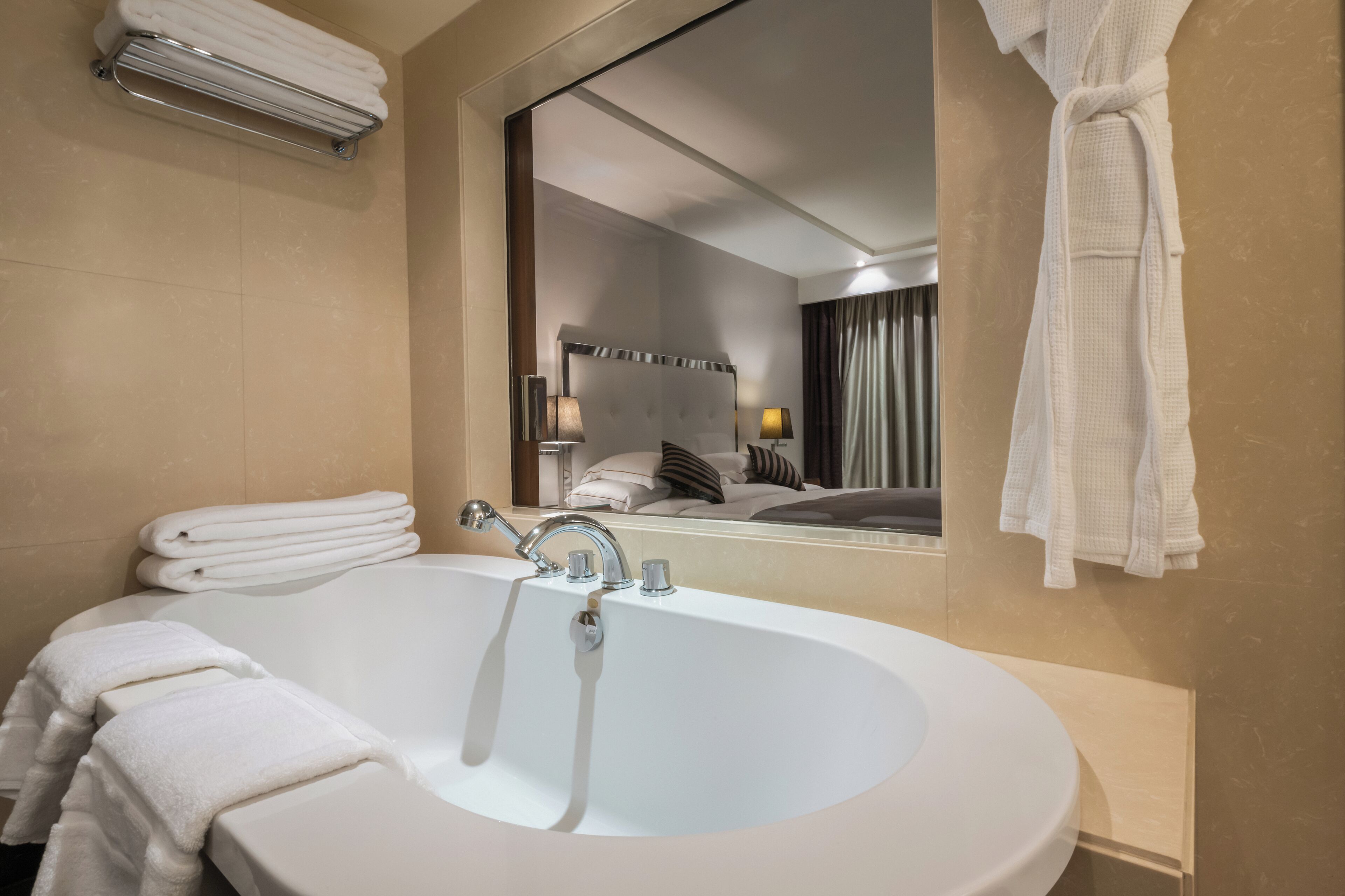 Suite, 1 King Bed, Sea View (Ambassador) | Bathroom | Eco-friendly toiletries, hair dryer, slippers, bidet