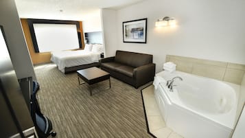 Standard Room, 1 King Bed, Jetted Tub | Desk, blackout drapes, iron/ironing board, free cribs/infant beds