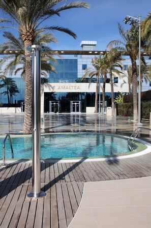 Indoor pool, outdoor pool, pool umbrellas, sun loungers