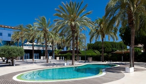 Indoor pool, outdoor pool, pool umbrellas, pool loungers