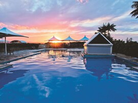 Outdoor pool, pool umbrellas, sun loungers