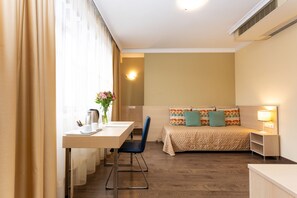 Junior Suite, 1 Bedroom | Minibar, desk, iron/ironing board, free WiFi