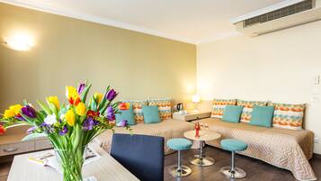 Suite, 1 Bedroom | Minibar, desk, iron/ironing board, free WiFi