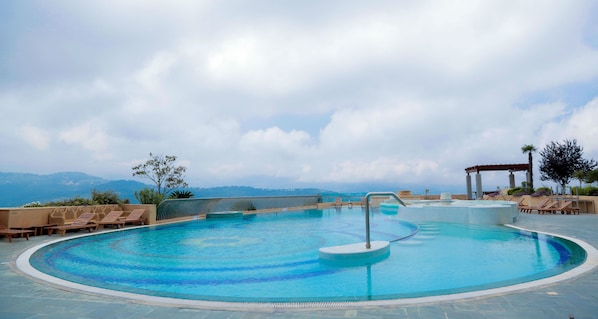 Indoor pool, outdoor pool, sun loungers