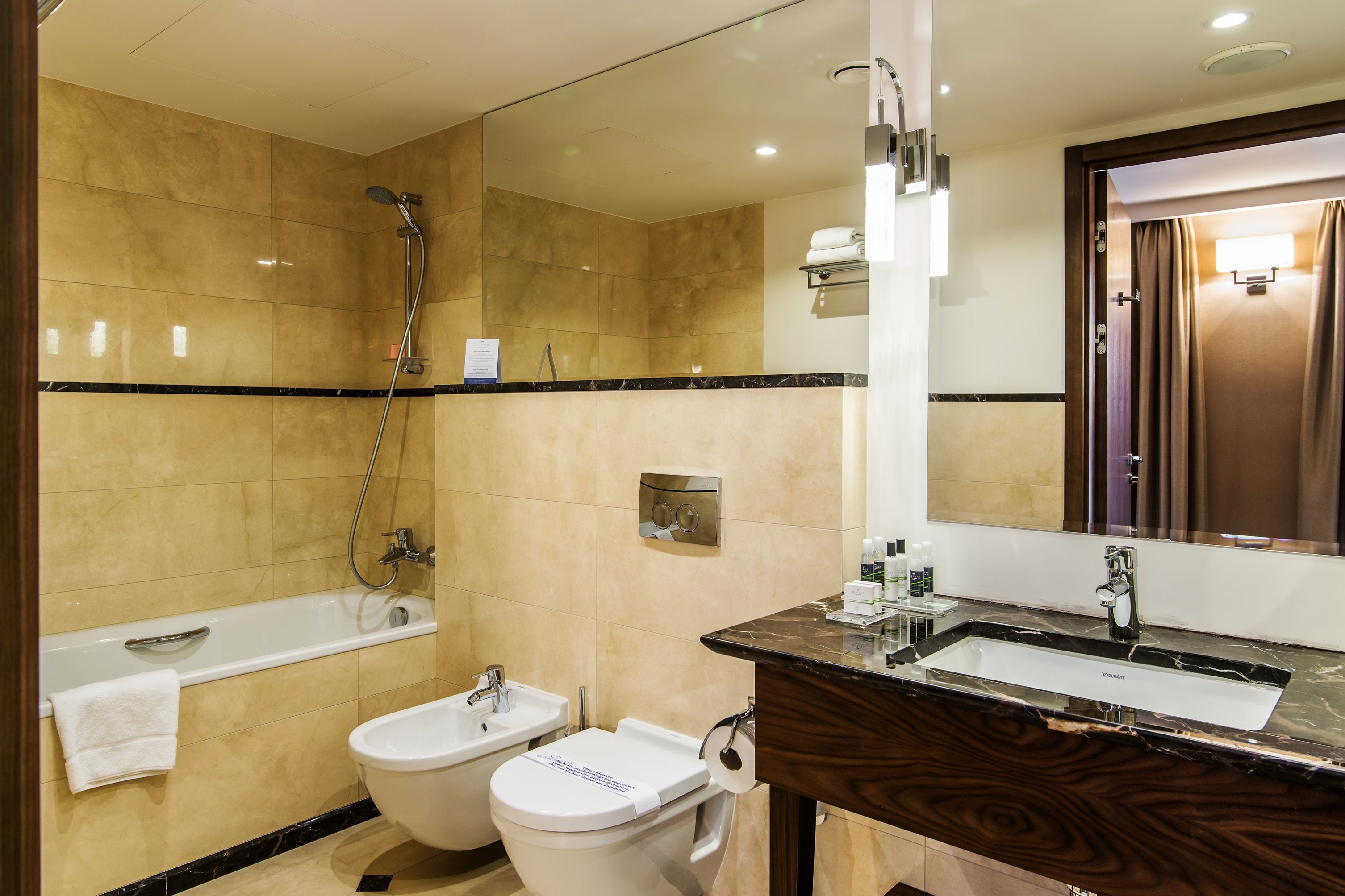 business apartment | bathroom | free toiletries, hair dryer, bathrobes, towels