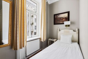 Pillow-top beds, desk, blackout curtains, free cots/infant beds
