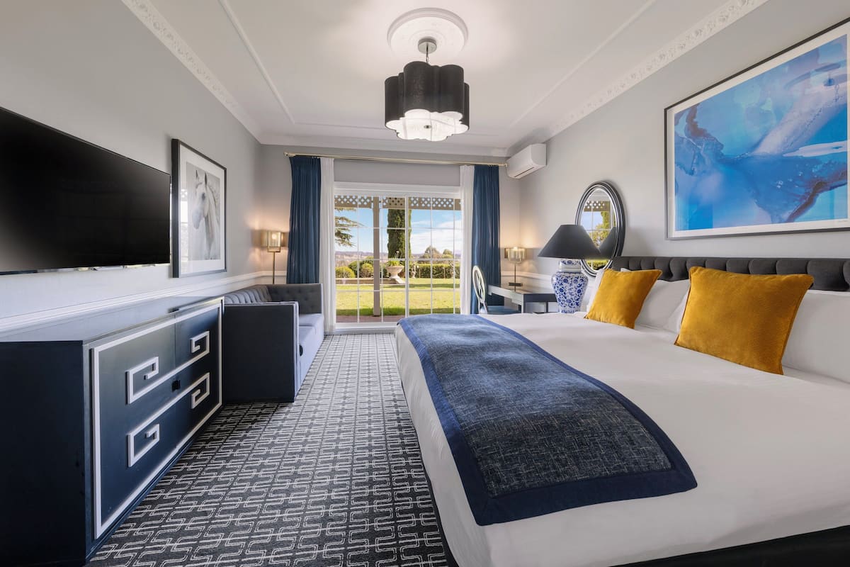 Premium bedding, desk, laptop workspace, blackout curtains