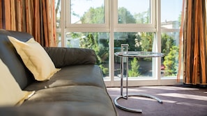 Junior Suite, 1 Bedroom, Non Smoking, Resort View | Living area | 81-cm LED TV with satellite channels, TV, first-run films