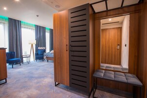 Deluxe Double or Twin Room | Living area | 50-inch LED TV with digital channels, Smart TV