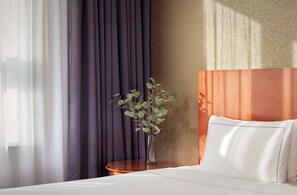 Ropa de cama de alta calidad y minibar