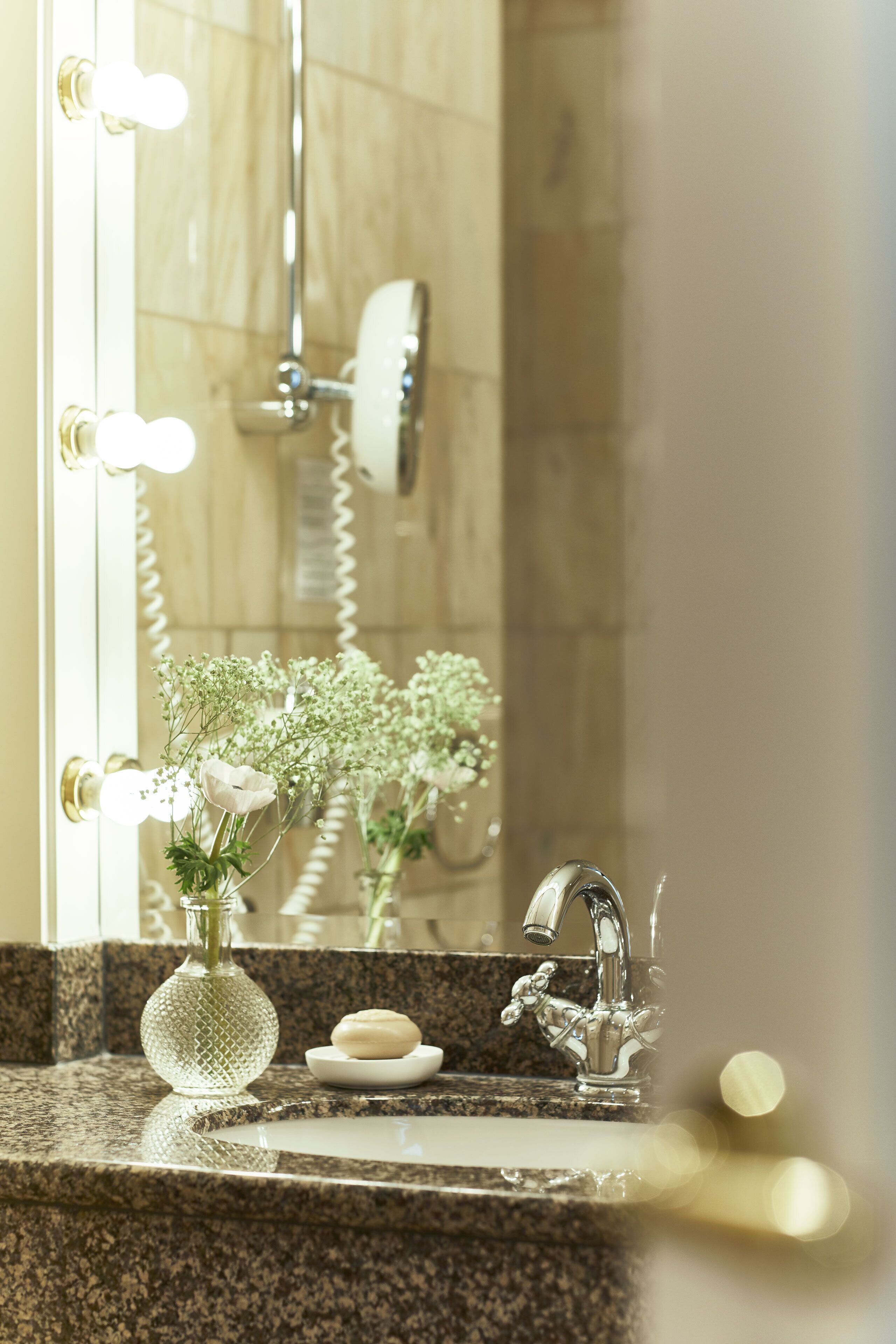 eco-friendly toiletries, hair dryer, bathrobes, slippers