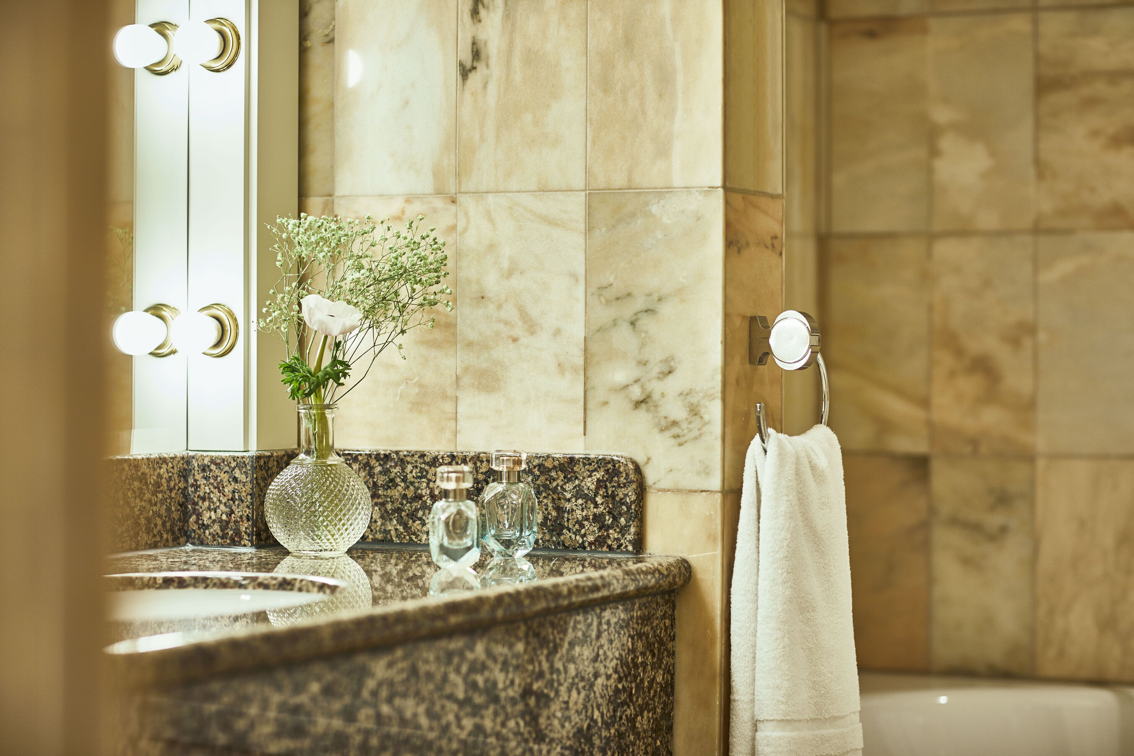 eco-friendly toiletries, hair dryer, bathrobes, slippers