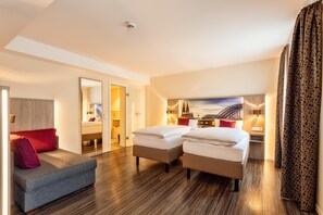 Hypoallergeen beddengoed, een minibar, een kluis op de kamer, een bureau