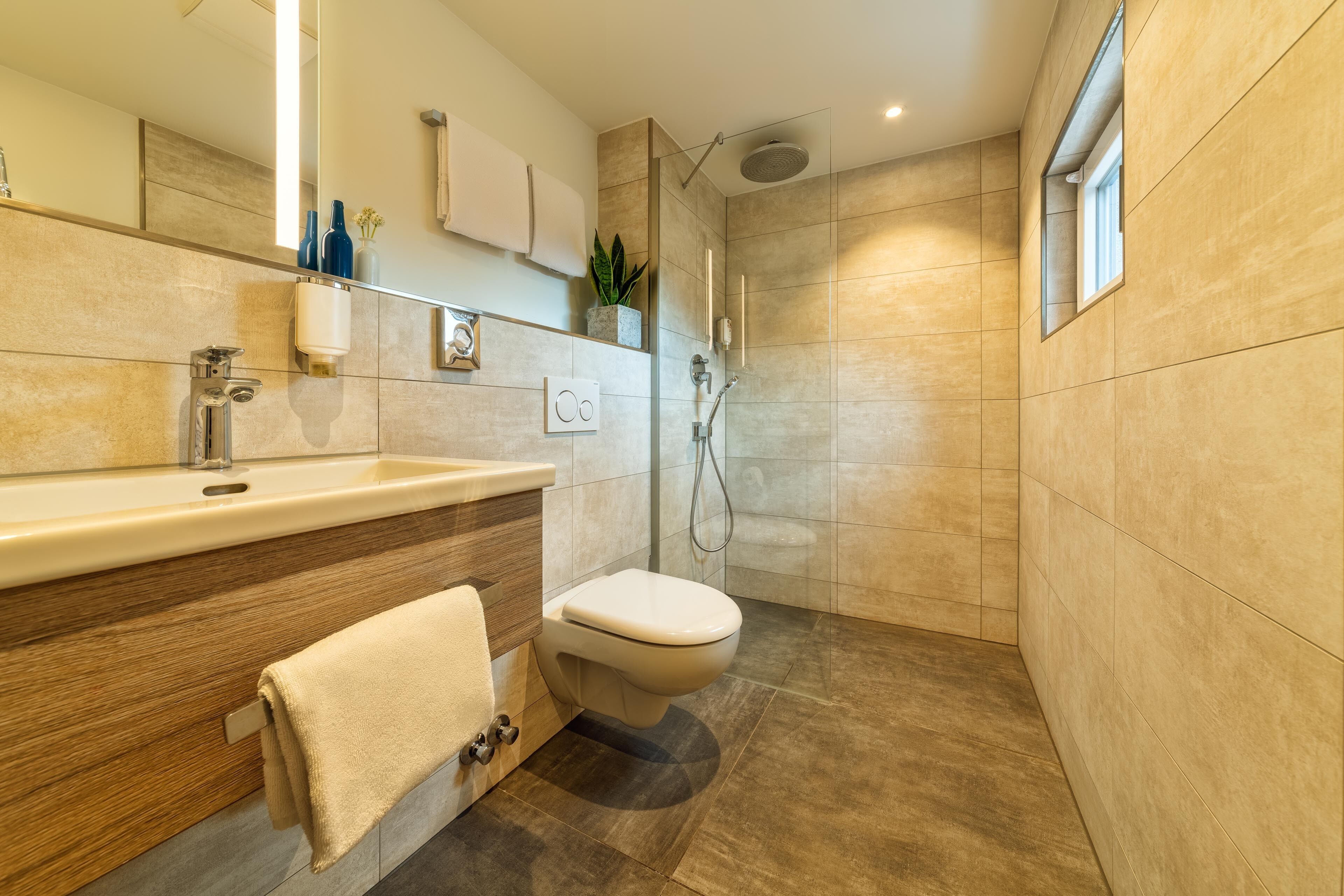 family room | bathroom | shower, free toiletries, hair dryer, towels