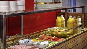 A buffet with fruits, vegetables, and beverages. - ibis Buenos Aires Congreso (Buenos Aires)