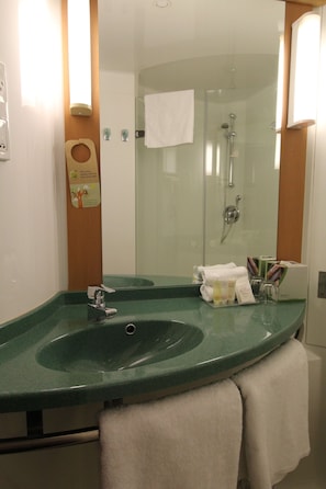 Shower, eco-friendly toiletries, hair dryer, towels