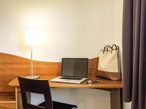 In-room safe, desk, iron/ironing board, free cribs/infant beds