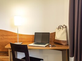 In-room safe, desk, iron/ironing board, free cribs/infant beds
