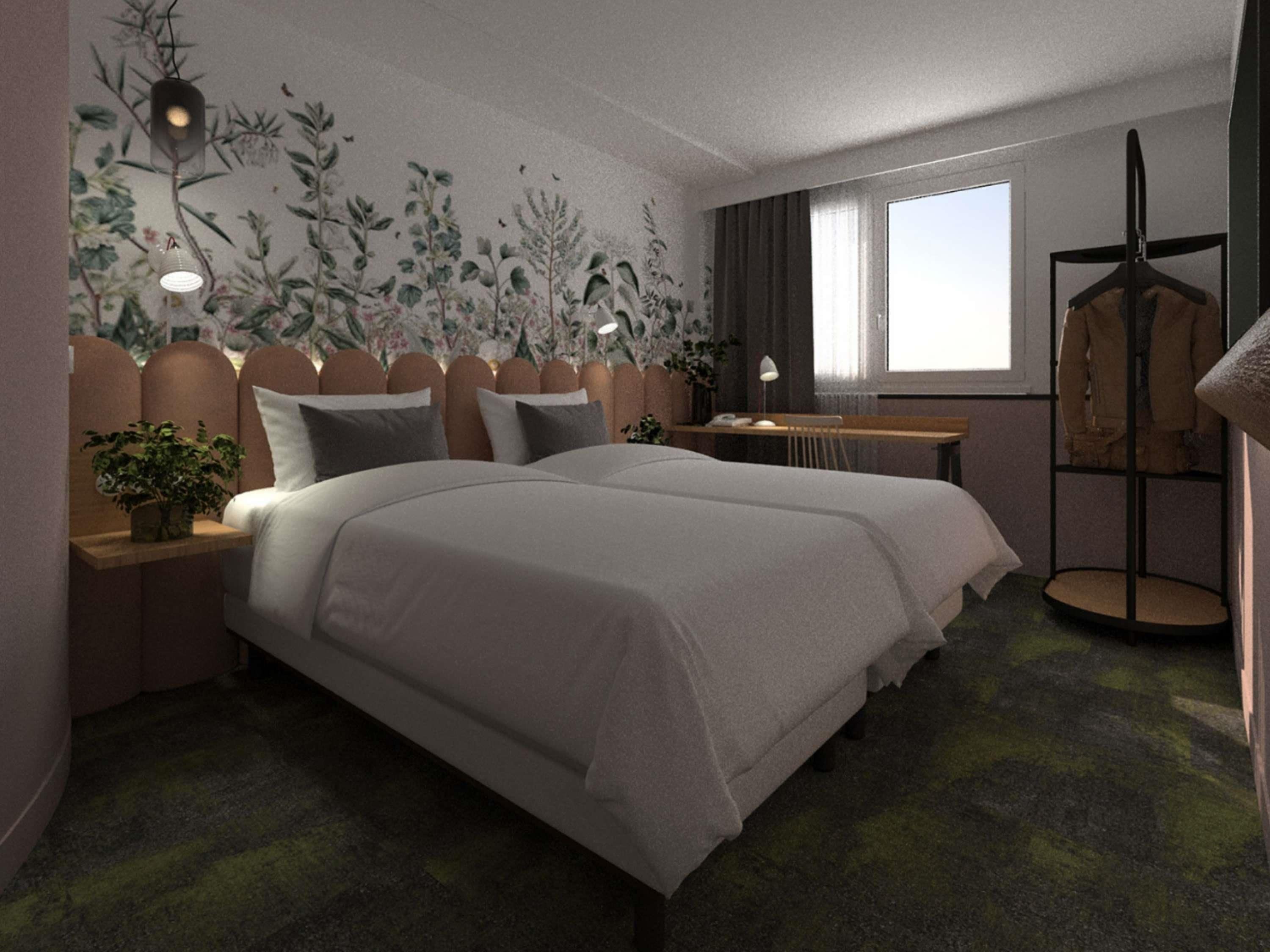 A modern bedroom with a large bed, a desk, and a chair.