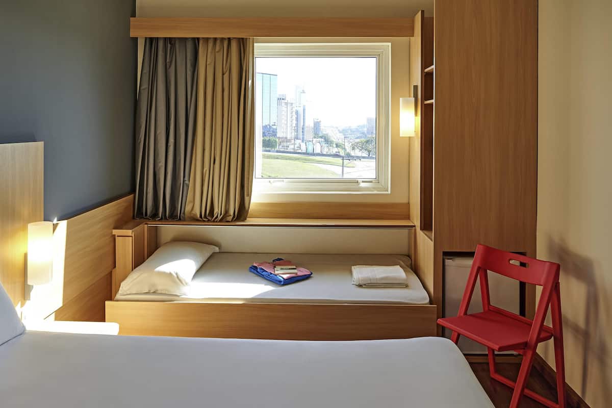 Standard Apartment, Multiple Beds | Minibar, in-room safe, desk, blackout drapes