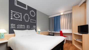 Luxe beddengoed, bedden met traagschuimmatras, een kluis op de kamer