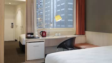 Desk, iron/ironing board, free cribs/infant beds, rollaway beds