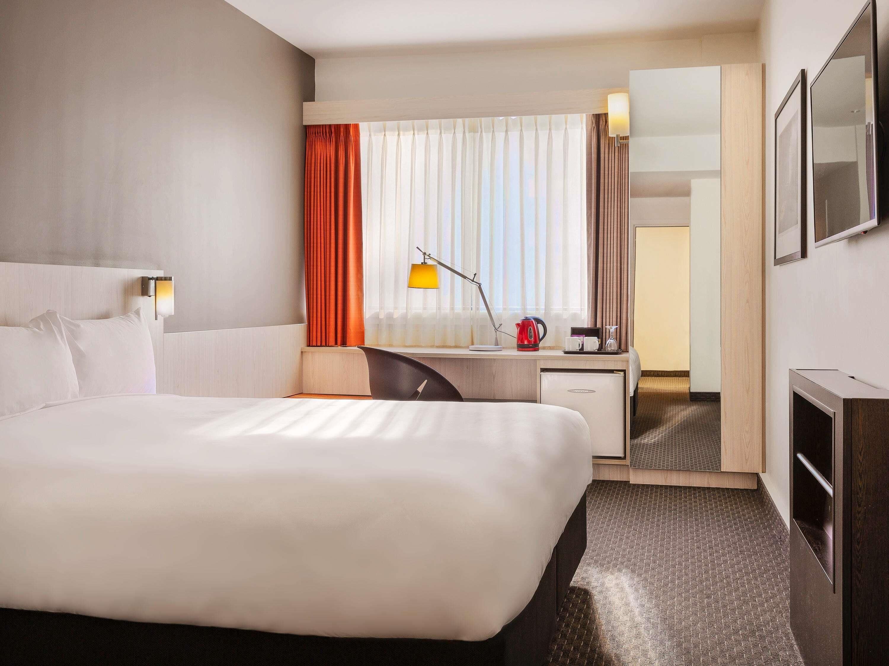 Standard Room, 1 Queen Bed (Accessible) | Desk, iron/ironing board, free cots/infant beds, rollaway beds