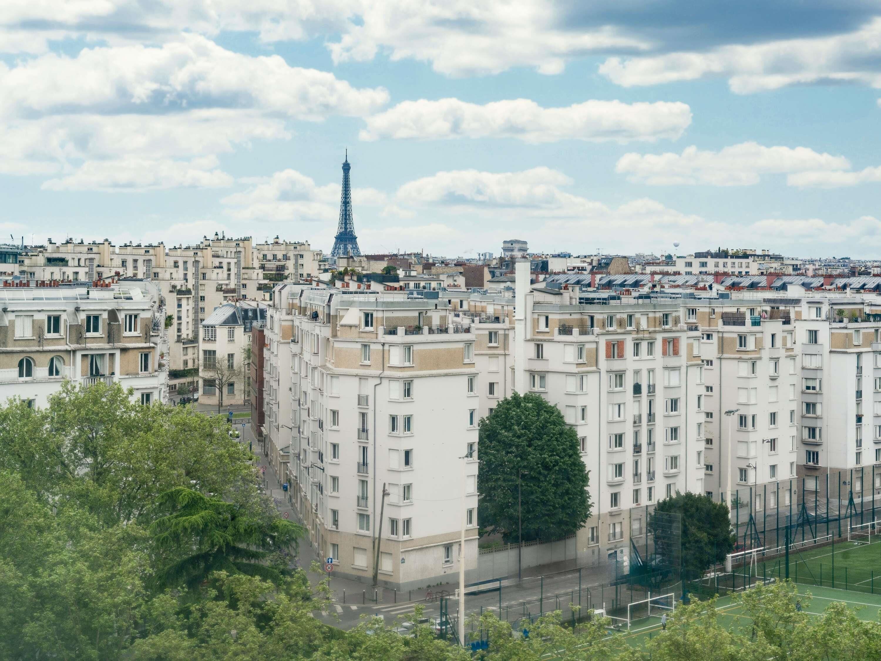 executive room, 1 queen bed, tower (eiffel tower view) | premium bedding, in-room safe, desk, laptop workspace