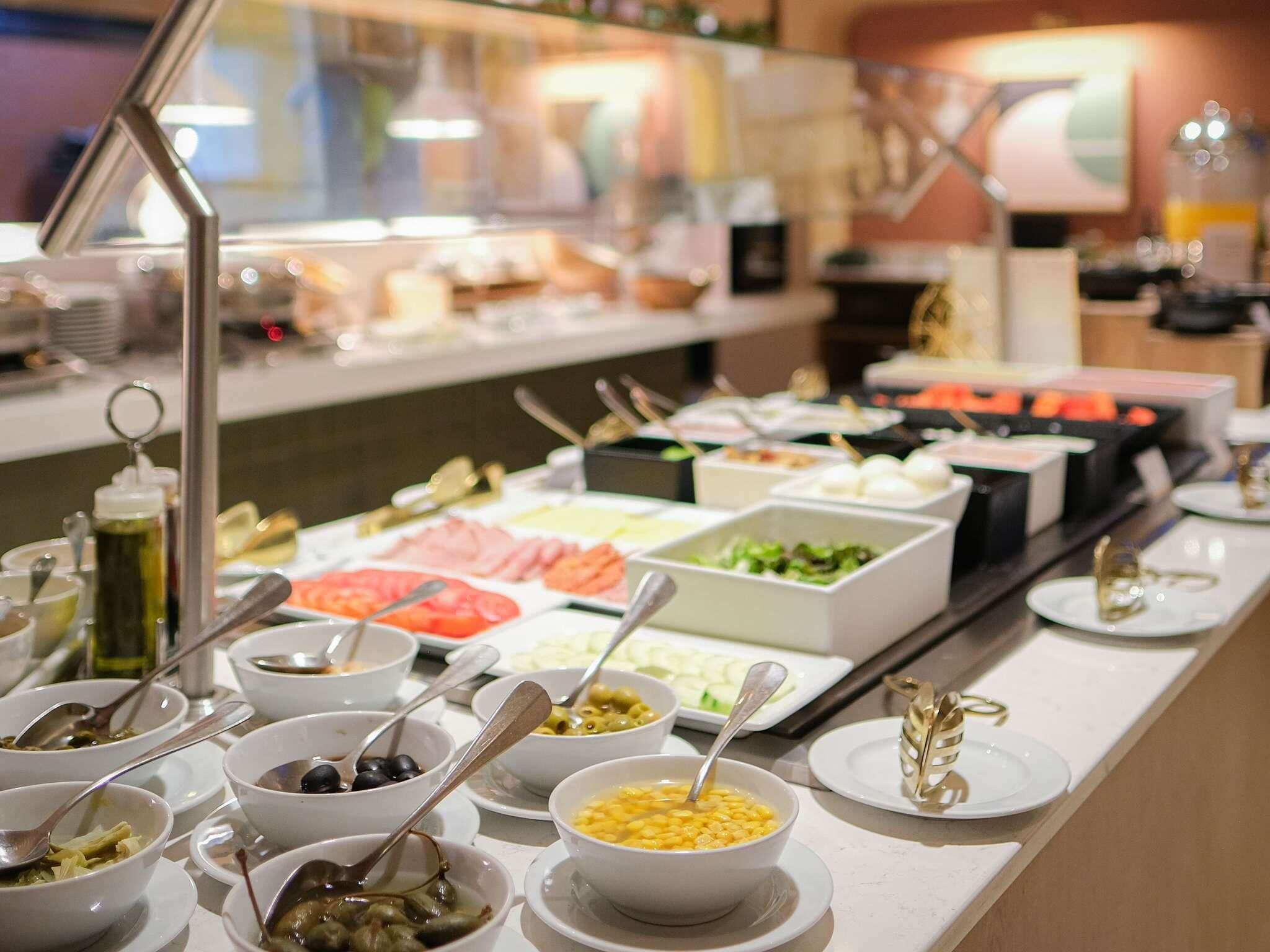 Breakfast, lunch, dinner served; international cuisine 