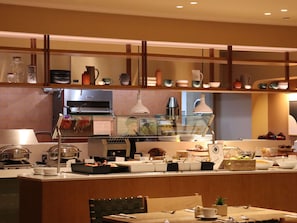 Breakfast, lunch, dinner served; international cuisine