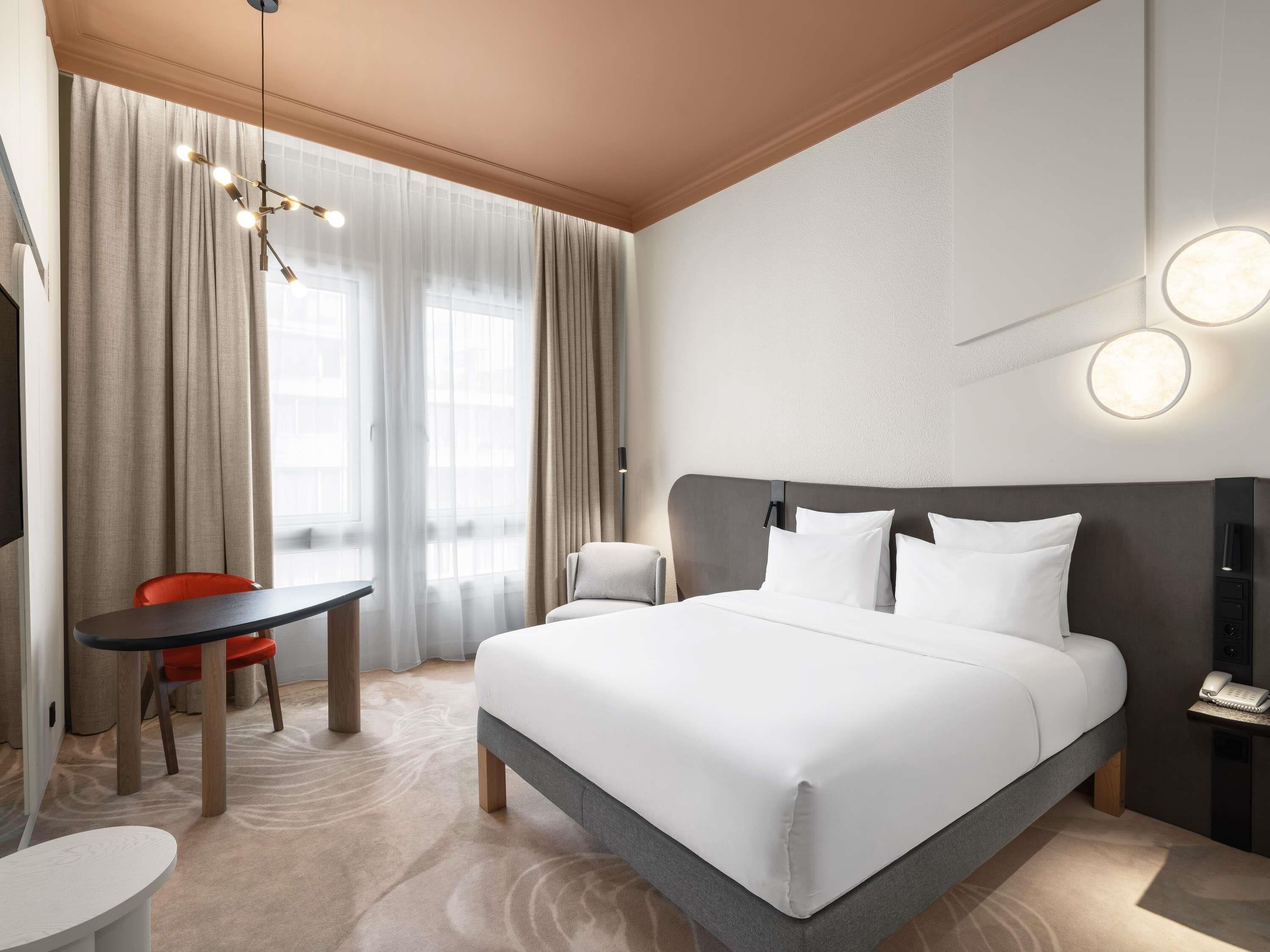 Hypo-allergenic bedding, minibar, in-room safe, desk