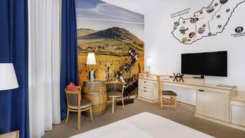 Hypo-allergenic bedding, minibar, in-room safe, desk